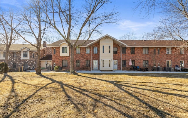 view of property featuring central AC unit