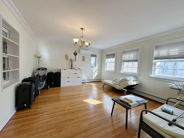 living area with light wood finished floors, crown molding, and a notable chandelier