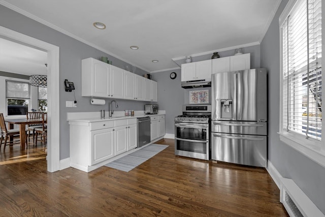 kitchen featuring stainless steel appliances, light countertops, visible vents, and white cabinets