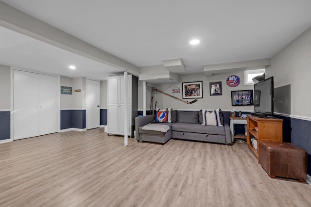 living room featuring light wood-type flooring and recessed lighting