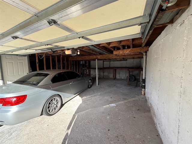 garage featuring a garage door opener