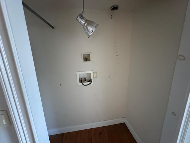 laundry room with laundry area, washer hookup, wood finished floors, and baseboards