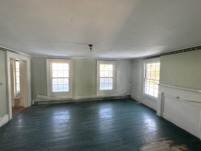 empty room featuring dark wood-type flooring