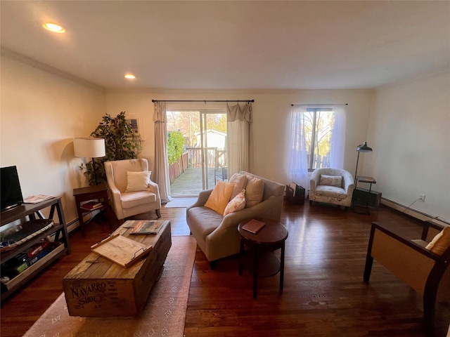 living area featuring a wealth of natural light, recessed lighting, and wood finished floors