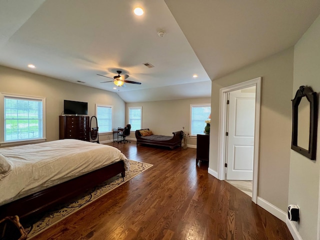 bedroom featuring lofted ceiling, recessed lighting, visible vents, wood finished floors, and baseboards