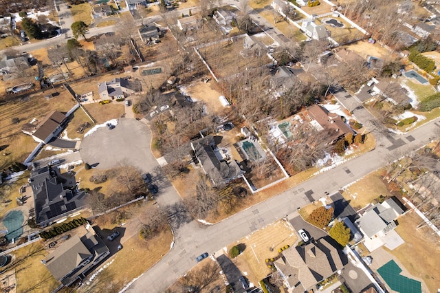 birds eye view of property with a residential view