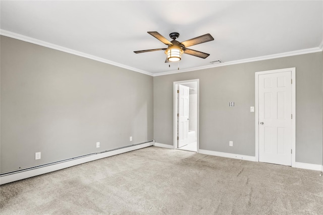 carpeted empty room featuring a baseboard heating unit, baseboards, visible vents, and crown molding