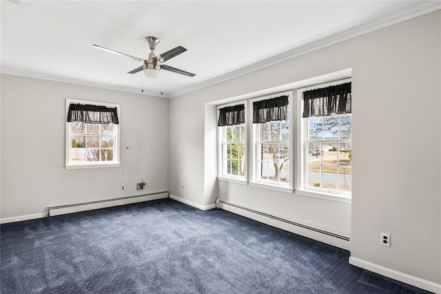 empty room with a healthy amount of sunlight, ornamental molding, and baseboard heating