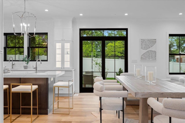 12 Fairway Ave, Rye, NY 10580 - dining space featuring light wood-style floors, a chandelier, and recessed lighting