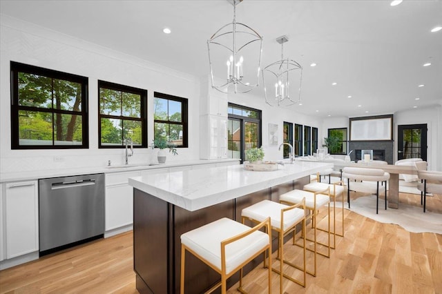 12 Fairway Ave, Rye, NY 10580 - kitchen with dishwasher, a sink, recessed lighting, white cabinetry, and light wood-type flooring