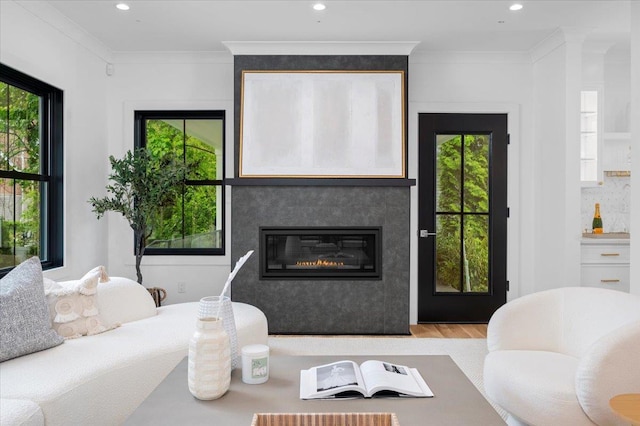 12 Fairway Ave, Rye, NY 10580 - living room featuring a glass covered fireplace, wood finished floors, recessed lighting, and ornamental molding