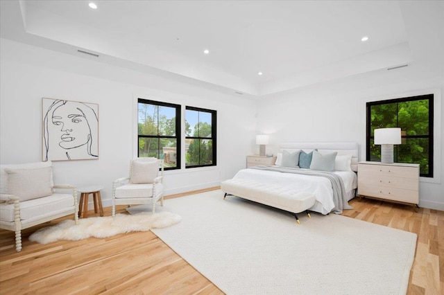 12 Fairway Ave, Rye, NY 10580 - bedroom featuring a raised ceiling, multiple windows, light wood finished floors, baseboards, and recessed lighting