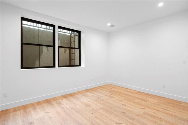 12 Fairway Ave, Rye, NY 10580 - unfurnished room with baseboards, wood finished floors, and recessed lighting