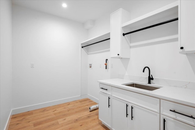12 Fairway Ave, Rye, NY 10580 - washroom with light wood finished floors, hookup for a washing machine, recessed lighting, and baseboards