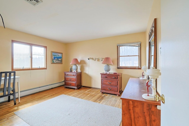 44 Karen Joy Dr, Middletown, NY 10940 - bedroom featuring light wood-style floors and a baseboard radiator