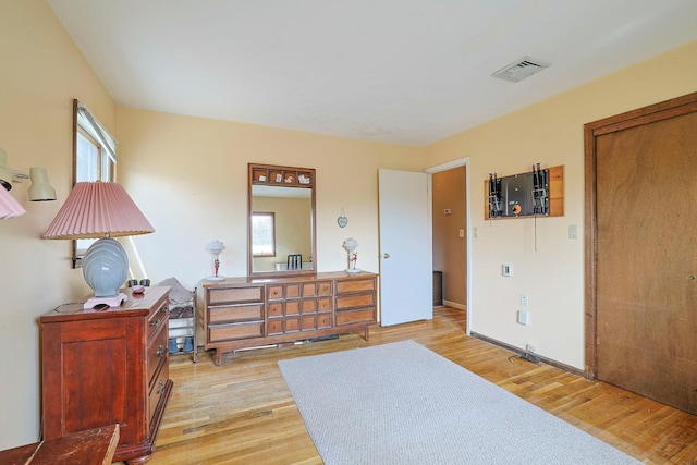 44 Karen Joy Dr, Middletown, NY 10940 - bedroom with multiple windows, light wood-style flooring, and baseboards