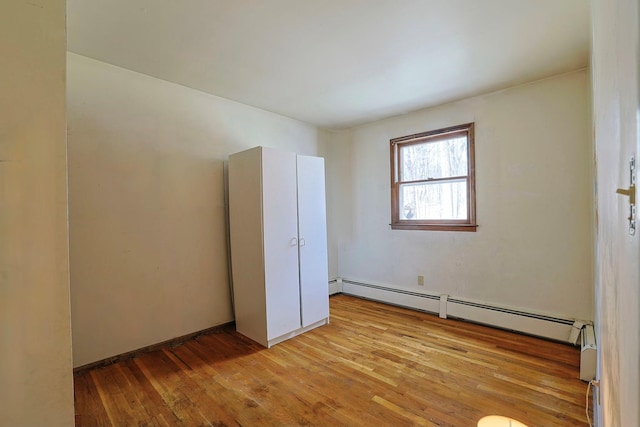 44 Karen Joy Dr, Middletown, NY 10940 - unfurnished room with a baseboard radiator and light wood-type flooring