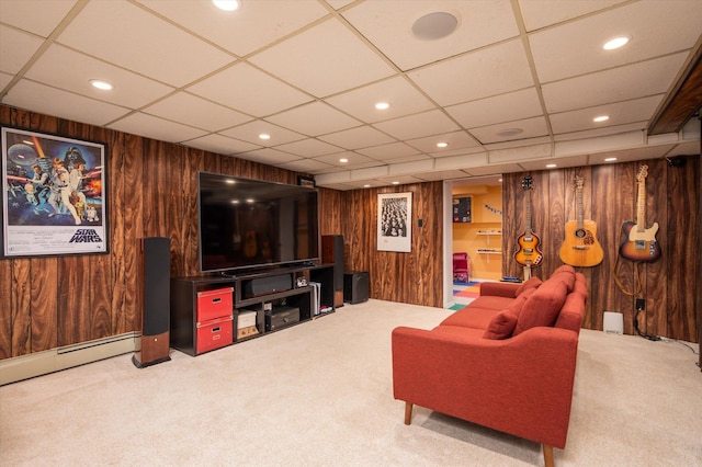 living area featuring wood walls, recessed lighting, and light colored carpet