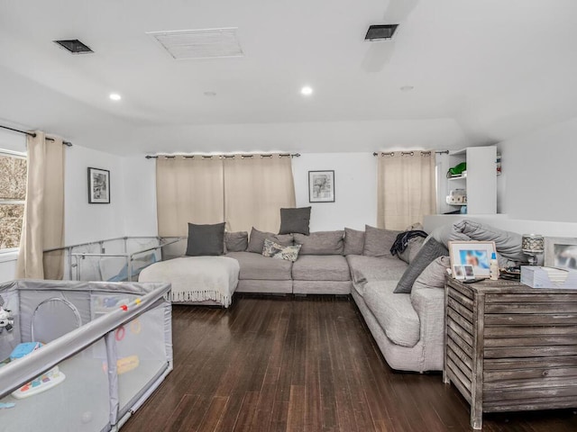 living room with visible vents, wood finished floors, and recessed lighting