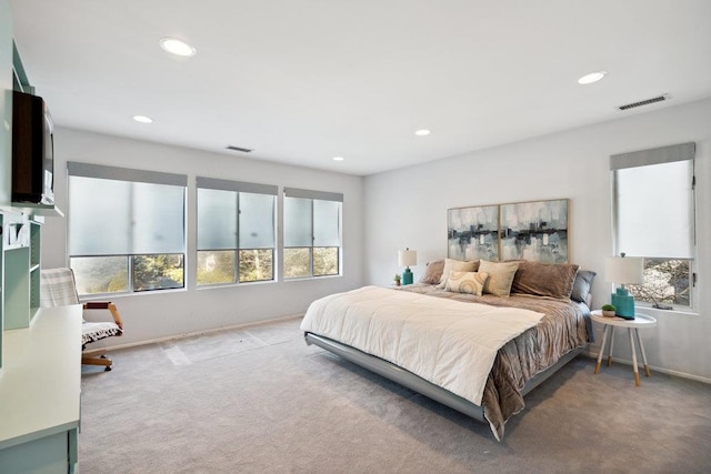 bedroom with baseboards, visible vents, carpet flooring, and recessed lighting