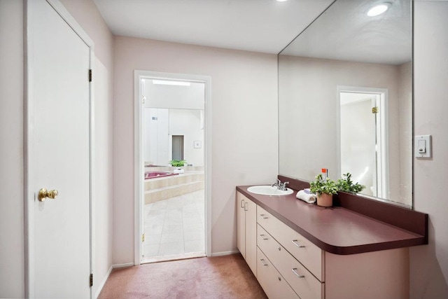 interior space featuring vanity and baseboards