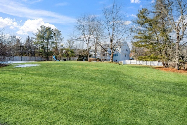 view of yard featuring fence