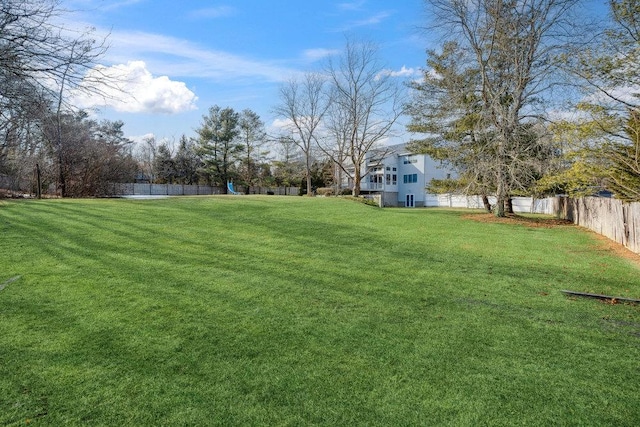 view of yard featuring fence