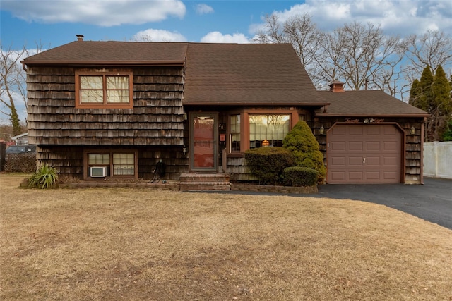 view of front of house featuring driveway and an attached garage