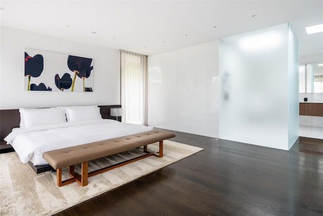 bedroom featuring wood finished floors
