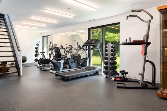 exercise room featuring visible vents
