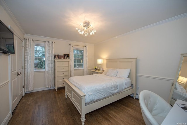 bedroom with ornamental molding, dark wood-style flooring, a baseboard heating unit, and an inviting chandelier