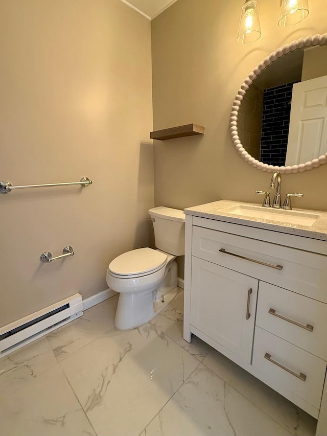 bathroom featuring marble finish floor, toilet, baseboard heating, vanity, and baseboards