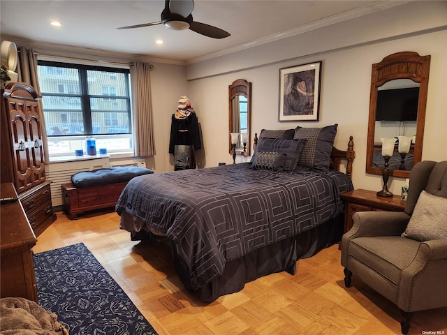 bedroom featuring ornamental molding and a ceiling fan