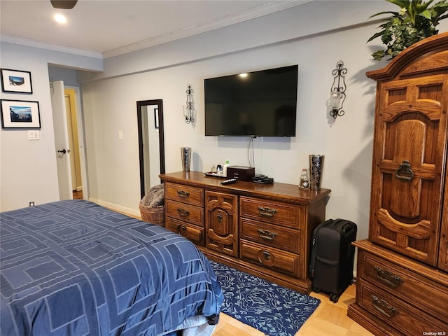 bedroom featuring crown molding