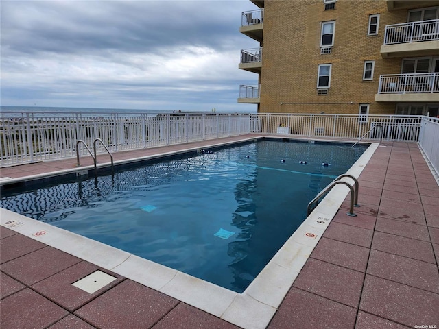 community pool with fence