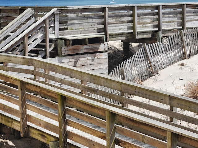 deck featuring a water view