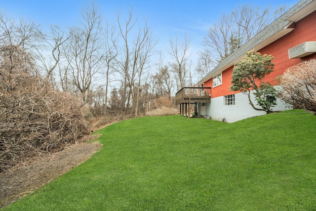 view of yard with a wooden deck