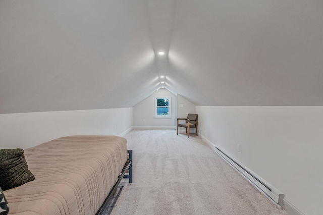 bedroom with carpet floors, baseboards, baseboard heating, and lofted ceiling