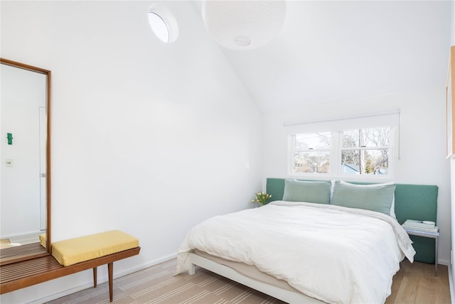 bedroom with vaulted ceiling