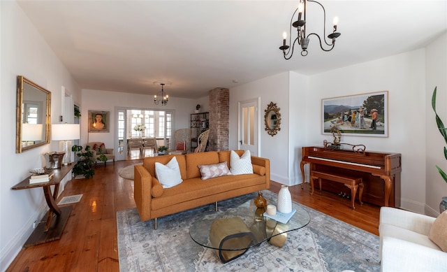 71 Old Mountain Rd S, Nyack, NY 10960 - living room featuring a chandelier, hardwood / wood-style flooring, and baseboards