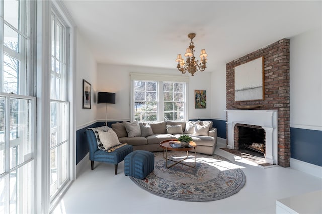 71 Old Mountain Rd S, Nyack, NY 10960 - living room with a chandelier, a fireplace, and baseboards