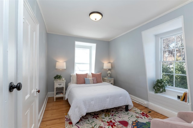 71 Old Mountain Rd S, Nyack, NY 10960 - bedroom with light wood-type flooring, baseboards, and crown molding