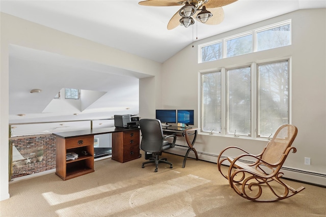 carpeted home office with vaulted ceiling and ceiling fan