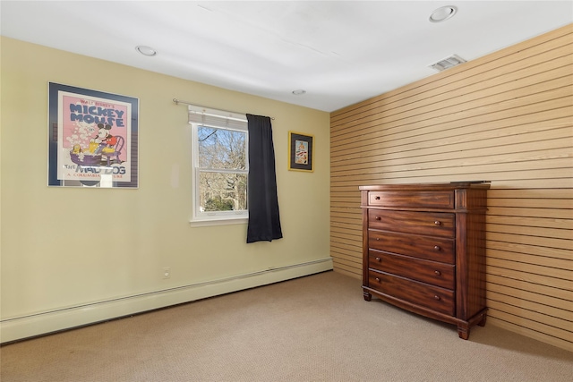 unfurnished bedroom featuring a baseboard radiator, visible vents, light carpet, and recessed lighting