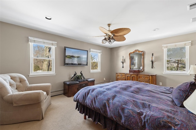 bedroom featuring a baseboard radiator, recessed lighting, visible vents, light carpet, and ceiling fan