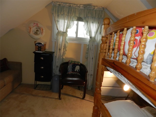 living area with vaulted ceiling and carpet flooring