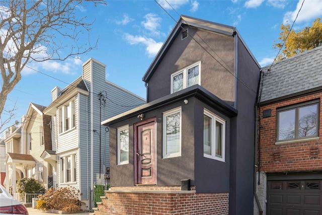 view of front of property featuring stucco siding