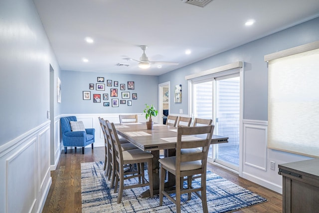 dining room with visible vents, a wainscoted wall, ceiling fan, wood finished floors, and recessed lighting