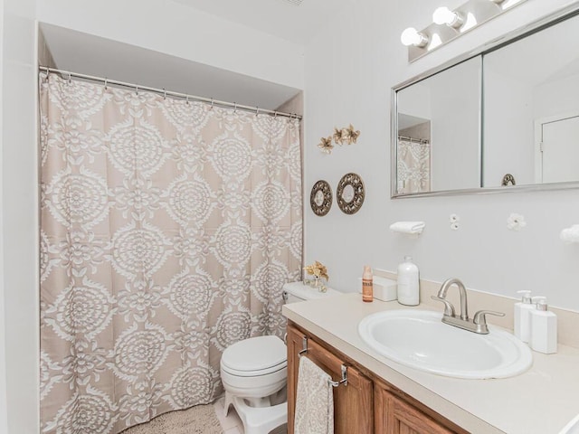 full bath with vanity and toilet