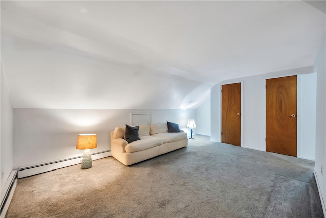 unfurnished room featuring a baseboard heating unit, a baseboard radiator, vaulted ceiling, and carpet